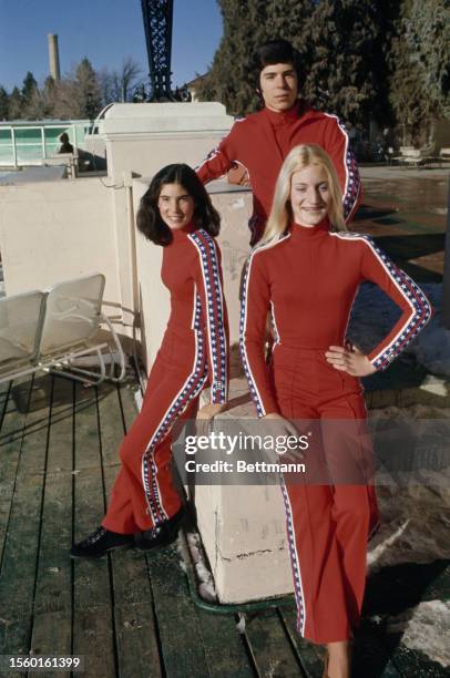 Figure skaters Gale Fuhrman , her brother Joel Fuhrman and Lisa Marie Allen model the US team's uniforms for the upcoming Winter Olympics, Colorado...