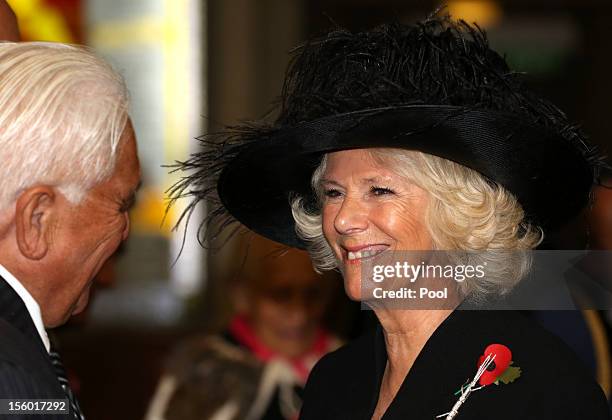 Camilla, Duchess of Cornwall is greeted with a traditional Hongi from Grant Hawke at a Maori Welcome at the War Memorial Museum on November 11, 2012...