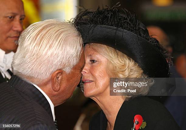 Camilla, Duchess of Cornwall is greeted with a traditional Hongi from Grant Hawke at a Maori Welcome at the War Memorial Museum on November 11, 2012...