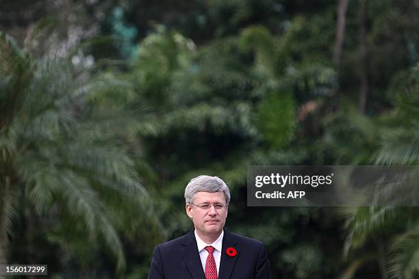 Canadian Prime Minister Stephen Harper speaks during a Rememberance Day ceremony at the Sai Wan war cemetery in Hong Kong on November 11, 2012....