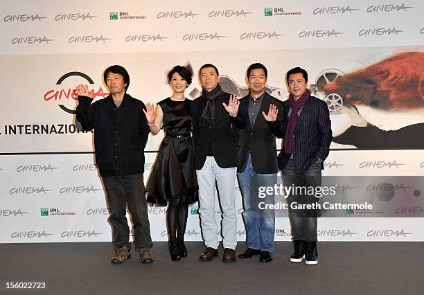 Writer Liu Zhenyun, director Feng Xiaogang, actors Xu Fan, Zhang Guo Li and producer Wang Zhonglei attend the "Back To 1942" Photocall during the 7th...