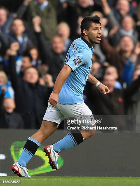 Sergio Aguero of Manchester City celebrates scoring his team's first goal to make the score 1-1 during the Barclays Premier League match between...