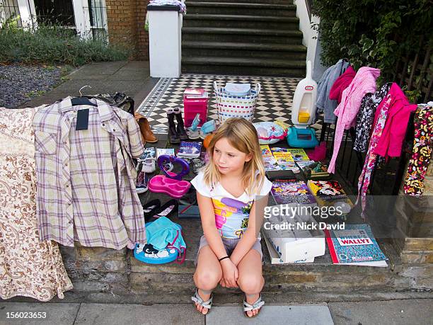 girl garage sale - garage sale stock pictures, royalty-free photos & images