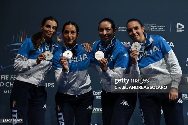 Silver medallists Italy's Rossella Fiamingo, Italy's Alberta Santuccio, Italy's Mara Navarria and Italy's Federica Isola pose on the podium after the...