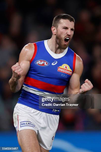 Marcus Bontempelli of the Bulldogs celebrates a goal during the round 19 AFL match between Essendon Bombers and Western Bulldogs at Marvel Stadium,...