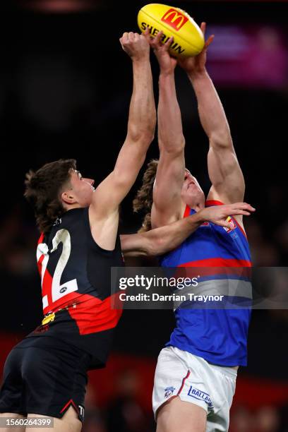 Aaron Naughton of the Bulldogs attempts to mark the ball during the round 19 AFL match between Essendon Bombers and Western Bulldogs at Marvel...