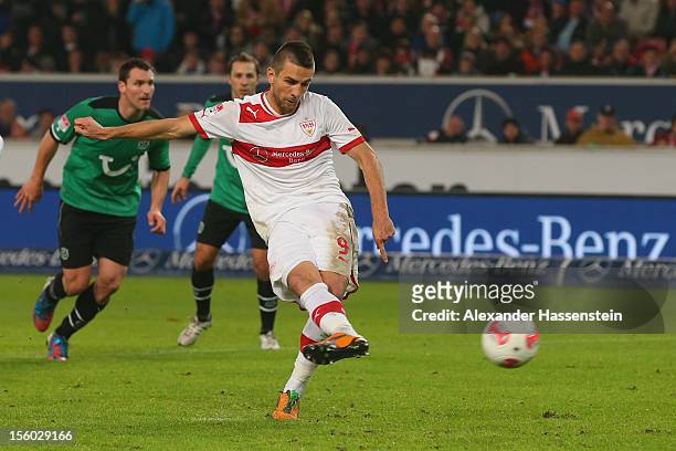 Vedad Ibisevic of Stuttgart scores the 2nd team goal with a penalty kick during the Bundesliga match between VfB Stuttgart and Hannover 96 at...