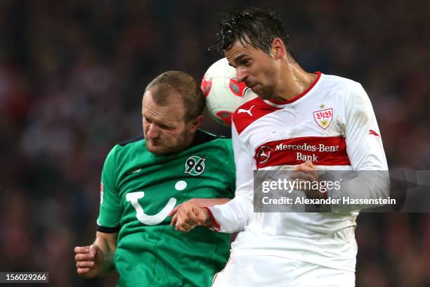 Martin Harnik of Stuttgart battles for the ball with Konstantin Rausch of Hannover during the Bundesliga match between VfB Stuttgart and Hannover 96...