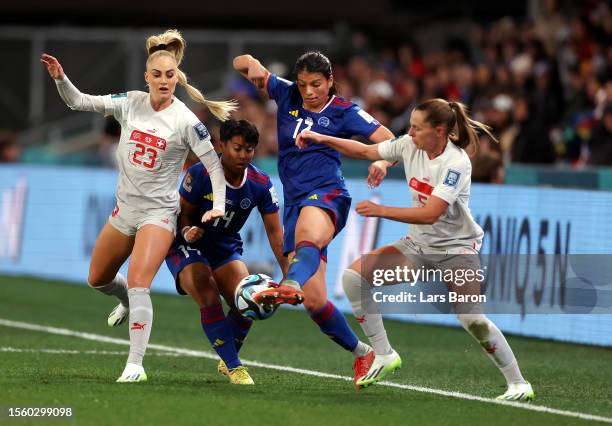 Alicia Barker of Philippines competes for the ball against Alisha Lehmann and Noelle Maritz of Switzerland during the FIFA Women's World Cup...