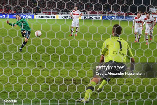 Jan Schlaudraff of Hannover scores the 2nd team goal witha penalty kick against Sven Ulreich, keeper of Stuttgart during the Bundesliga match between...