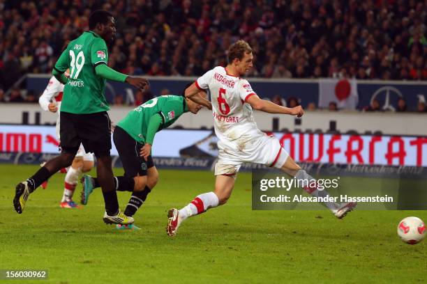 Mohammed Abdellaoue of Hannover scores the 3rd team goal against Georg Niedermeier of Stuttgart during the Bundesliga match between VfB Stuttgart and...