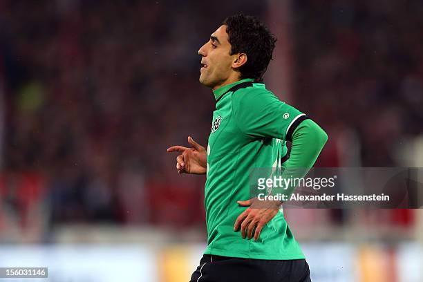 Mohammed Abdellaoue of Hannover celebrates scoring the 4th team goal during the Bundesliga match between VfB Stuttgart and Hannover 96 at...