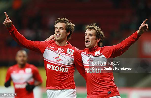 Dmitri Kombarov and Kirill Kombarov of FC Spartak Moscow celebrate after scoring a goal during the Russian Premier League match between FC Spartak...