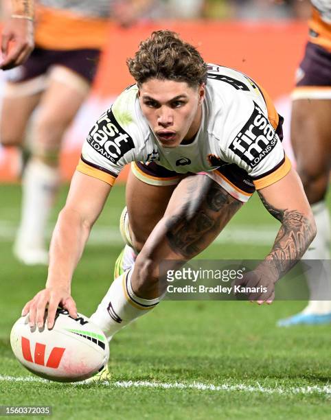 Reece Walsh of the Broncos scores a try during the round 21 NRL match between South Sydney Rabbitohs and Brisbane Broncos at Sunshine Coast Stadium...