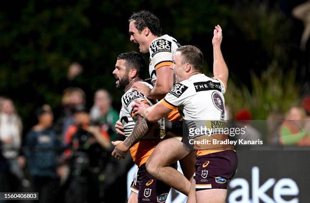 Adam Reynolds of the Broncos celebrates after scoring a try during the round 21 NRL match between South Sydney Rabbitohs and Brisbane Broncos at...