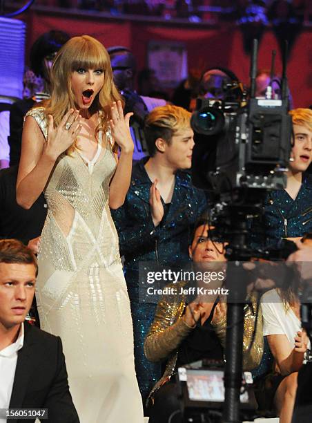 Singer Taylor Swift reacts to winning the Best Look award during the MTV EMA's 2012 at Festhalle Frankfurt on November 11, 2012 in Frankfurt am Main,...