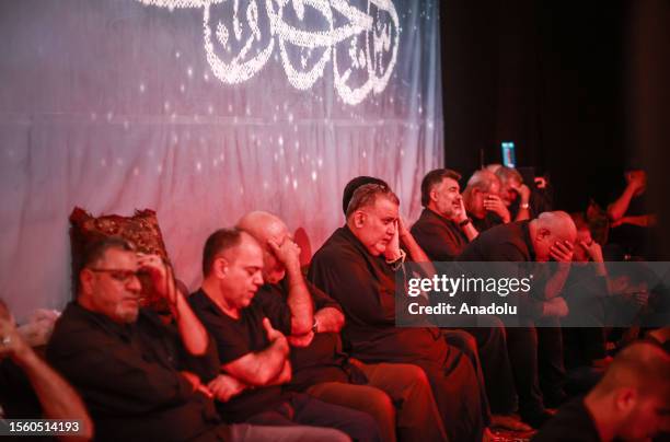 Hundreds of people take part in a mourning ritual, during the month of Muharram on the Islamic calendar, leading up to the day of Ashura, on July 28,...