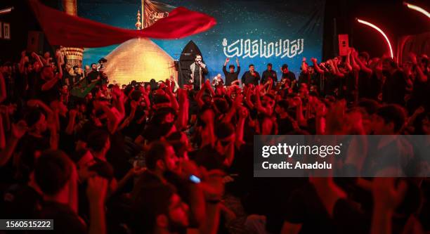 Hundreds of people take part in a mourning ritual, during the month of Muharram on the Islamic calendar, leading up to the day of Ashura, on July 28,...