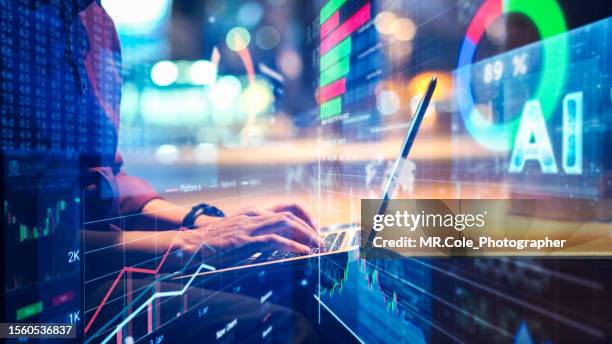 man using a laptop double exposure with business data analytics dashboard - tecnología de finanzas fotografías e imágenes de stock