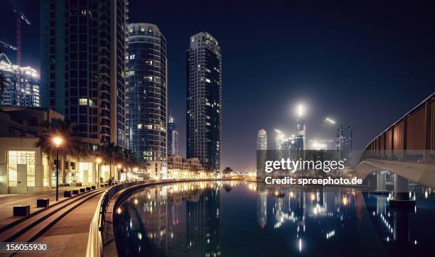 dubai building yard at night - work sites night stock pictures, royalty-free photos & images