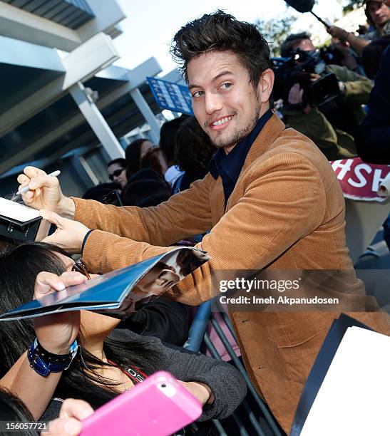 Actor Jackson Rathbone signs autographs for fans at the 'Twilight Saga: Breaking Dawn Part 2' Fan Camp held at L.A. LIVE on November 11, 2012 in Los...
