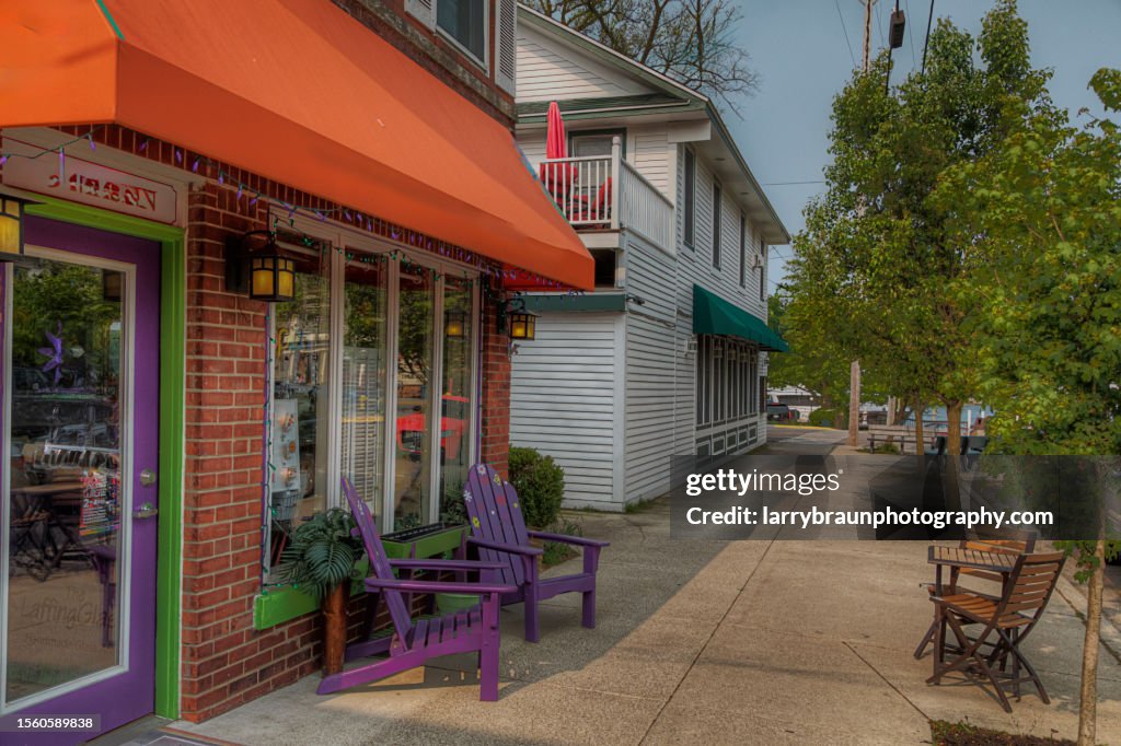 Purple Adirondack Chairs on the Sidewalk