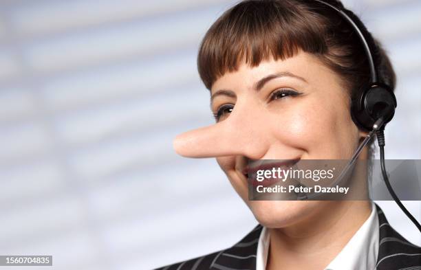 call center lady - speaking with forked tongue expressão inglesa imagens e fotografias de stock