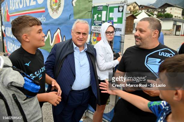 Lazio President Claudio Lotito signs autographs for his fans during the SS Lazio training session day 10 on July 21, 2023 in Auronzo di Cadore, Italy.
