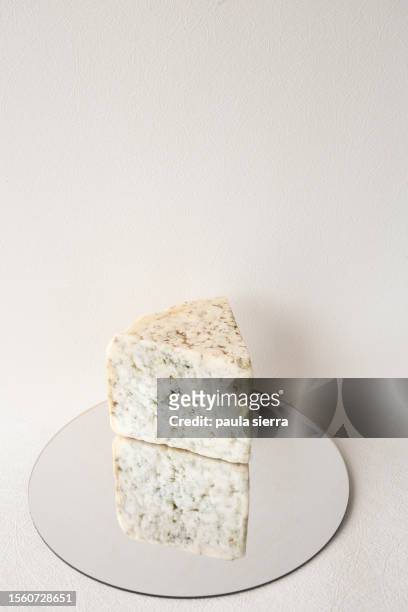 cabrales cheese reflected on a mirror - still life stock pictures, royalty-free photos & images