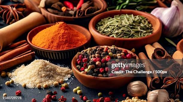 close-up of various spices on table,nagpur division,maharashtra,india - gewürze stock-fotos und bilder
