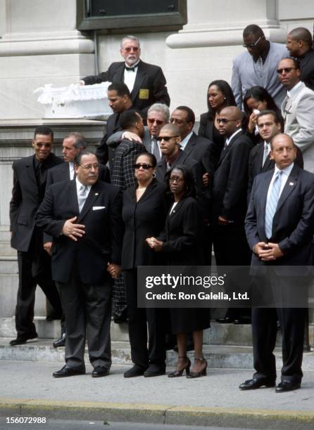 Aaliyah's father Michael Haughton, mother Diane Haughton, brother Rashad Haughton and Damon Dash