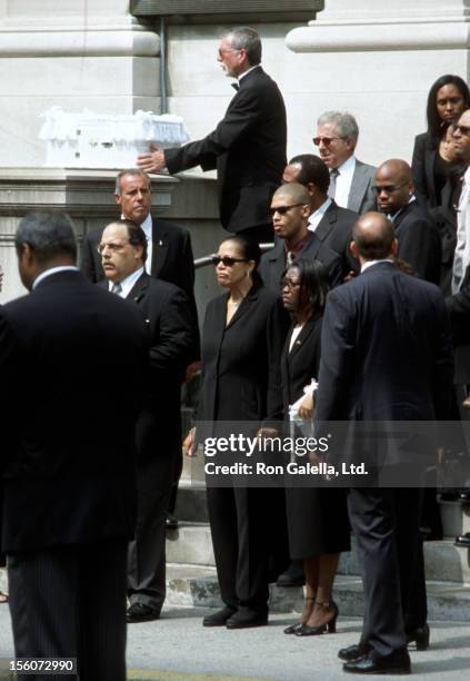 Aaliyah's father Michael Haughton, mother Diane Haughton, brother Rashad Haughton and Damon Dash