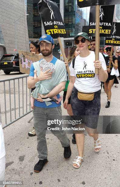 Daniel Radcliffe and Erin Darke join the picket line In New York City on July 21, 2023 in New York City. Members of SAG-AFTRA, Hollywood's largest...