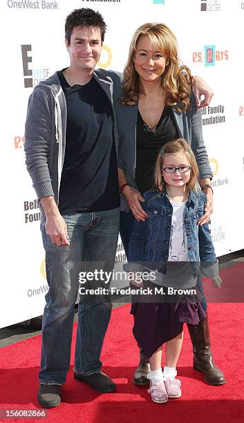 Actress Megyn Price and her family attend the 14th Aniversary Of P.S. Arts Express Yourself at the Barker Hangar Santa Monica Airport on November 11,...
