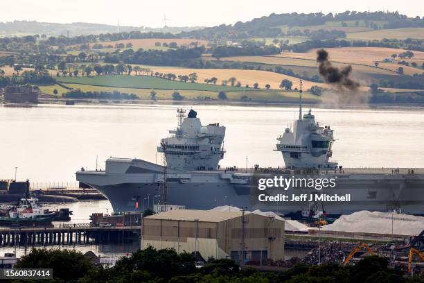 Aircraft carrier HMS Prince of Wales is sets sail from Rosyth Dockyard on July 21, 2023 in Rosyth, Scotland. The aircraft carrier has been in dry...