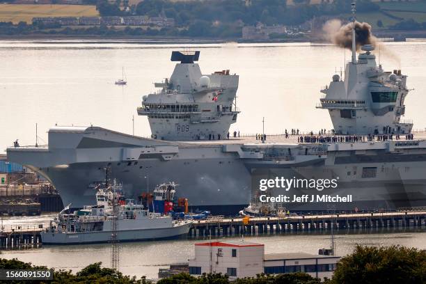 Aircraft carrier HMS Prince of Wales is sets sail from Rosyth Dockyard on July 21, 2023 in Rosyth, Scotland. The aircraft carrier has been in dry...