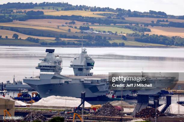 Aircraft carrier HMS Prince of Wales is sets sail from Rosyth Dockyard on July 21, 2023 in Rosyth, Scotland. The aircraft carrier has been in dry...