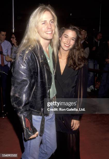 Musician Matthew Nelson and Actress Brooke Langton attend the 'JFK' Westwood Premiere on December 7, 1991 at Mann Village Theatre in Westwood,...