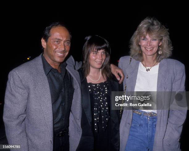Actor Paul Anka, wife Anne DeZogheb and daughter being photographed on March 21, 1989 at Spago Restaurant in West Hollywood, California.