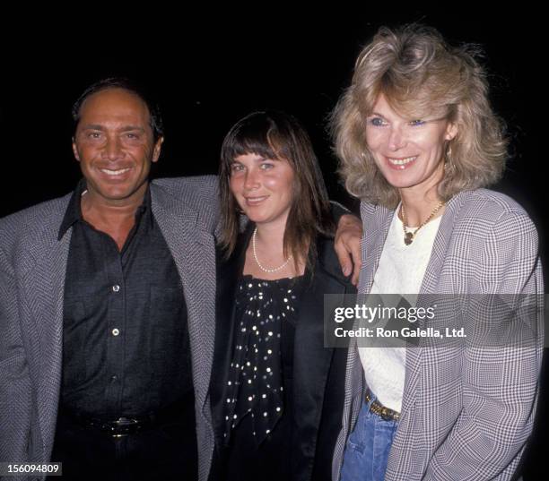 Actor Paul Anka, wife Anne DeZogheb and daughter being photographed on March 21, 1989 at Spago Restaurant in West Hollywood, California.