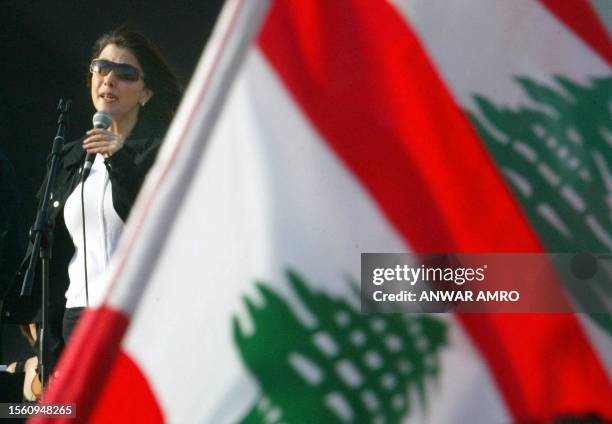 Lebanes singer Magida al-Roumi performs in downtown Beirut's landmark Martyrs Square 13 April 2005, as part of national unity celebrations to mark...