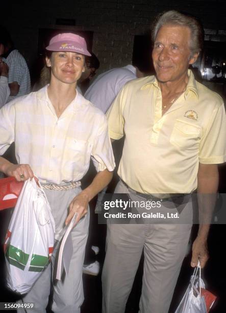 Actor Efrem Zimbalist, Jr. And daughter Actress Stephanie Zimbalist attend the 1990 Los Angeles Police-Celebrity Golf Tournament on May 19, 1990 at...