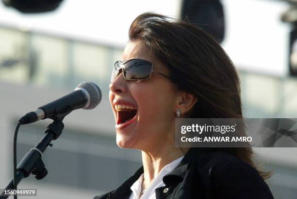 Lebanes singer Magida al-Roumi performs in downtown Beirut's landmark Martyrs Square 13 April 2005, as part of national unity celebrations to mark...