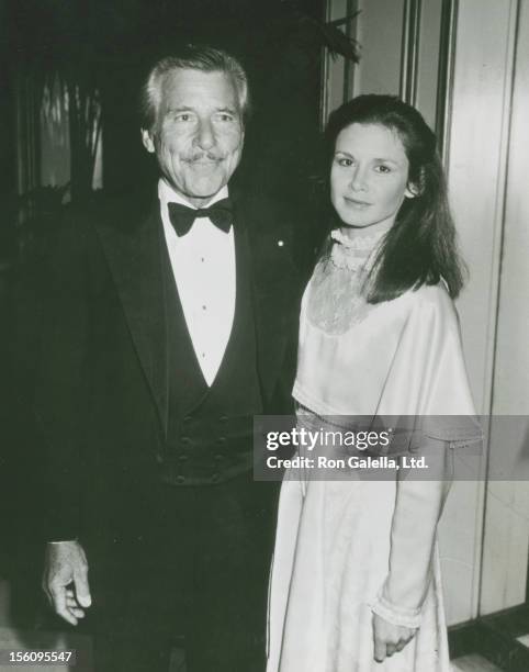 Actor Efrem Zimbalist, Jr. And actress Stephanie Zimbalist being photographed on April 1, 1983 at Chasen's Restaurant in Beverly Hills, California.