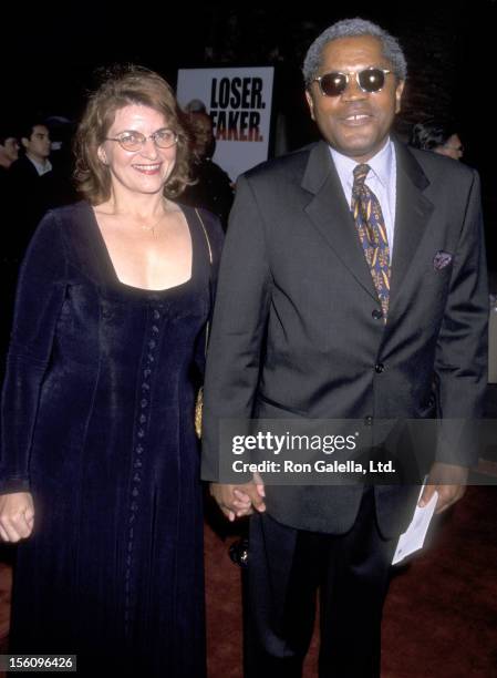 Actor Clarence Williams III and guest attend the 'Bowfinger' Universal City Premiere on August 10, 1999 at Universal Amphitheatre in Universal City,...