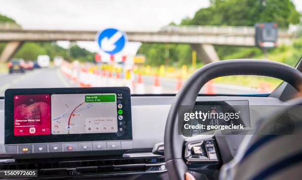 roadworks on uk motorway journey - global positioning system stock pictures, royalty-free photos & images