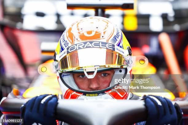 Max Verstappen of the Netherlands and Oracle Red Bull Racing prepares to drive in the garage during practice ahead of the F1 Grand Prix of Hungary at...