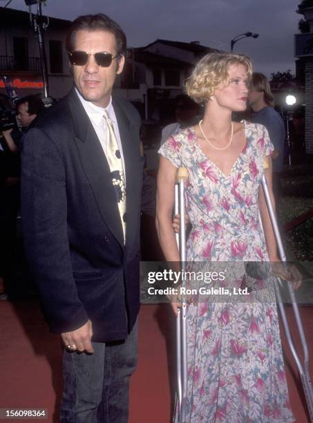 Actor Robert Davi and wife Christine Bolster attend the 'Lethal Weapon 3' Westwood Premiere on May 1, 1992 at Mann Village Theatre in Westwood,...