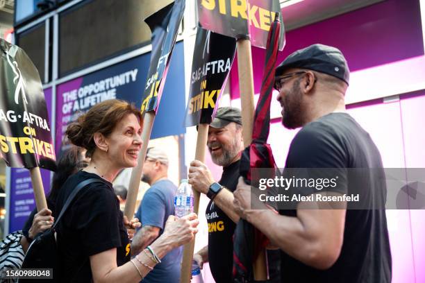 Jessica Hecht and Danny Burstein joins SAG-AFTRA members and supporters on the walk the picket line as the SAG-AFTRA Actors Union Strike continues on...