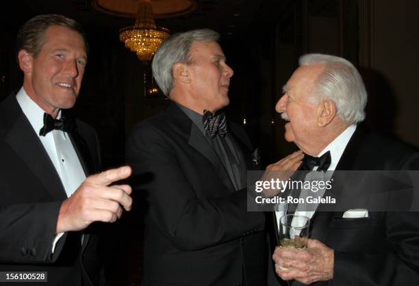 Brian Williams, Tom Brokaw, and Walter Cronkite during International Radio and Television Society Foundation 2004 Gold Medal Dinner at Waldorf...